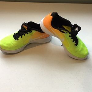 Nike, size 6Y. Great condition. Bottoms not worn. Fluorescent orange and green.